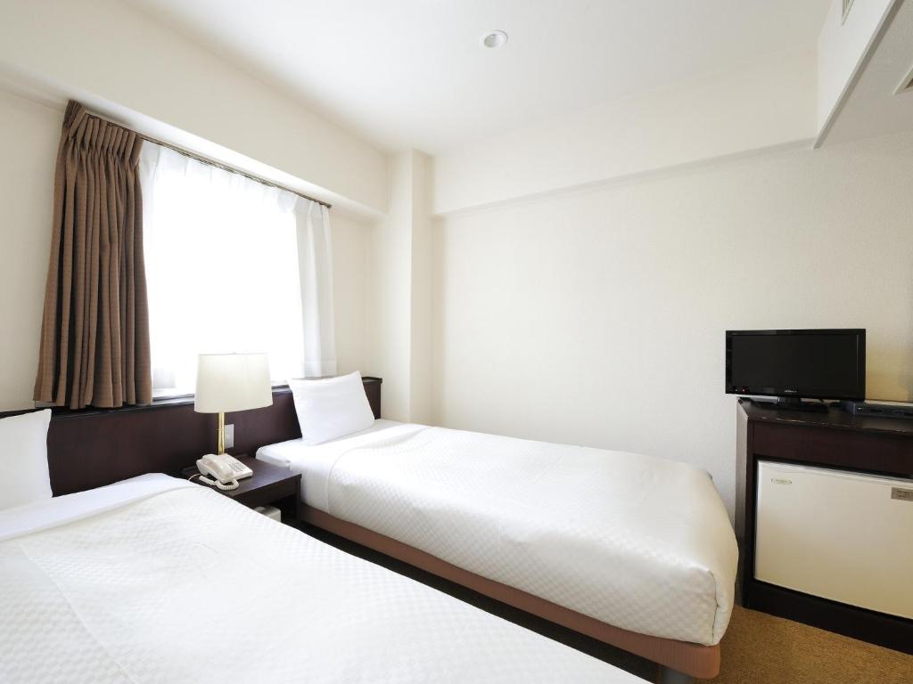 Sendai Business Hotel Ekimae Habitación foto